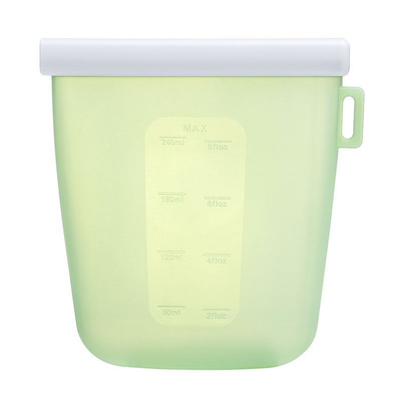 Bolsa de silicona reutilizable verde con medidor de ml, ideal para conservar alimentos