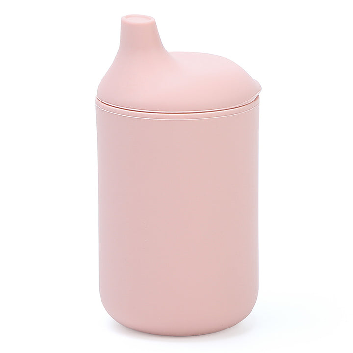 Vaso de aprendizaje para bebé de silicona color rosado pastel con boquilla suave, ideal para transición
