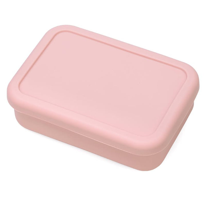 Tupper de silicona rosado con tapa hermética para almuerzo. Contenedor de comida compacto y seguro, ideal para transportar colaciones