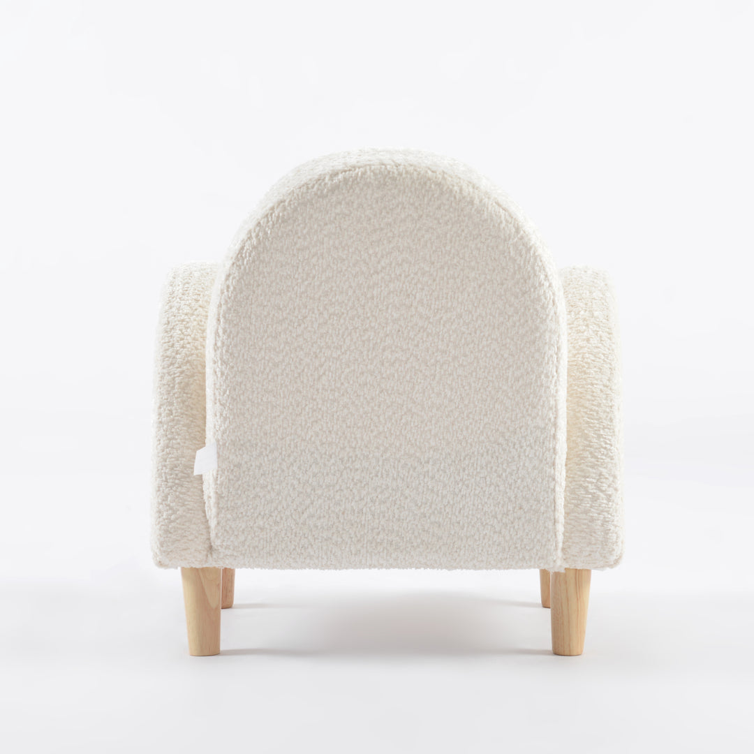 Sillón para niños pequeño vista desde atrás tapizado en blanco, mueble infantil cómodo y decorativo