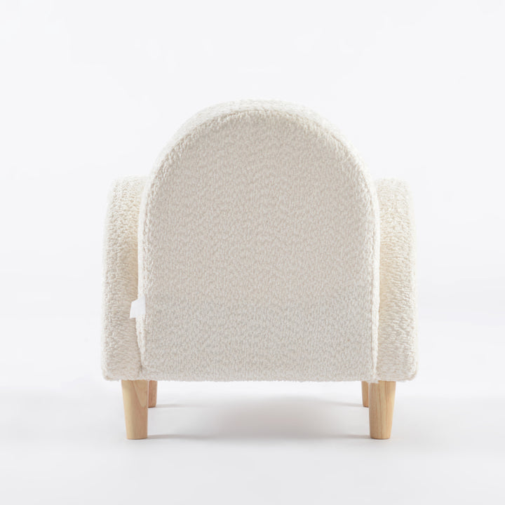 Sillón para niños pequeño vista desde atrás tapizado en blanco, mueble infantil cómodo y decorativo