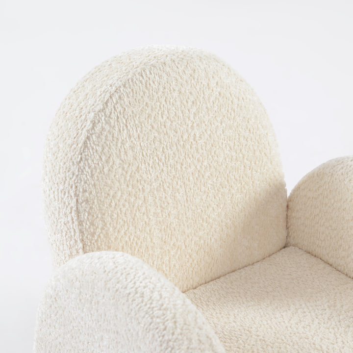 Sillón para niños pequeño en ángulo tapizado en blanco, mueble infantil cómodo y decorativo