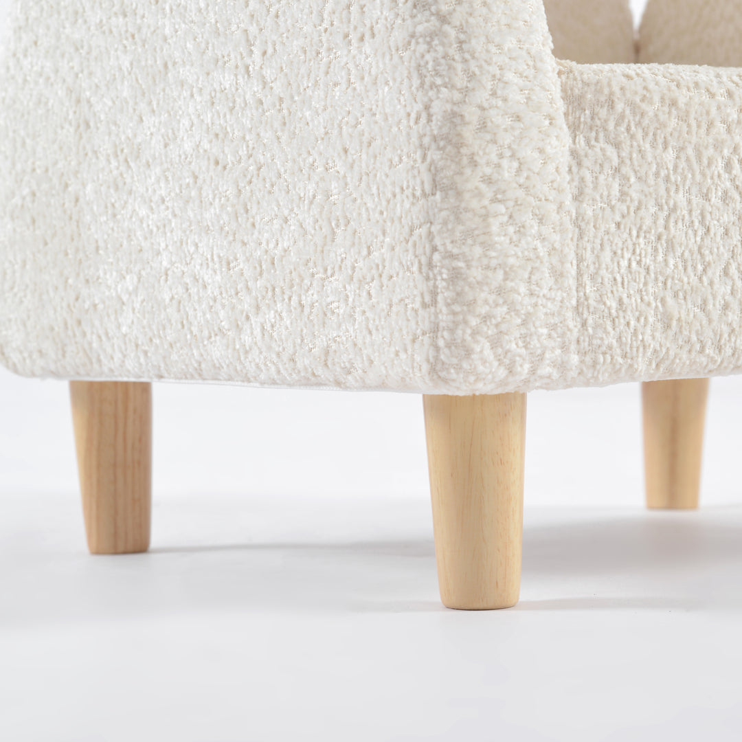 Textura de sillón para niños pequeño, detalle de patas cilíndricas de madera