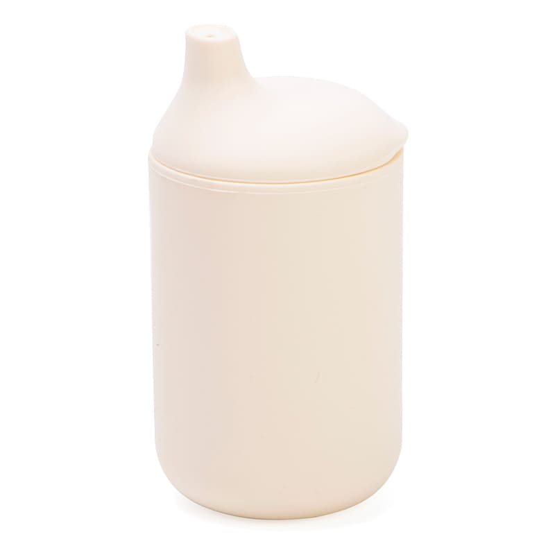Vaso de aprendizaje para bebé de silicona color crema con boquilla suave, ideal para transición