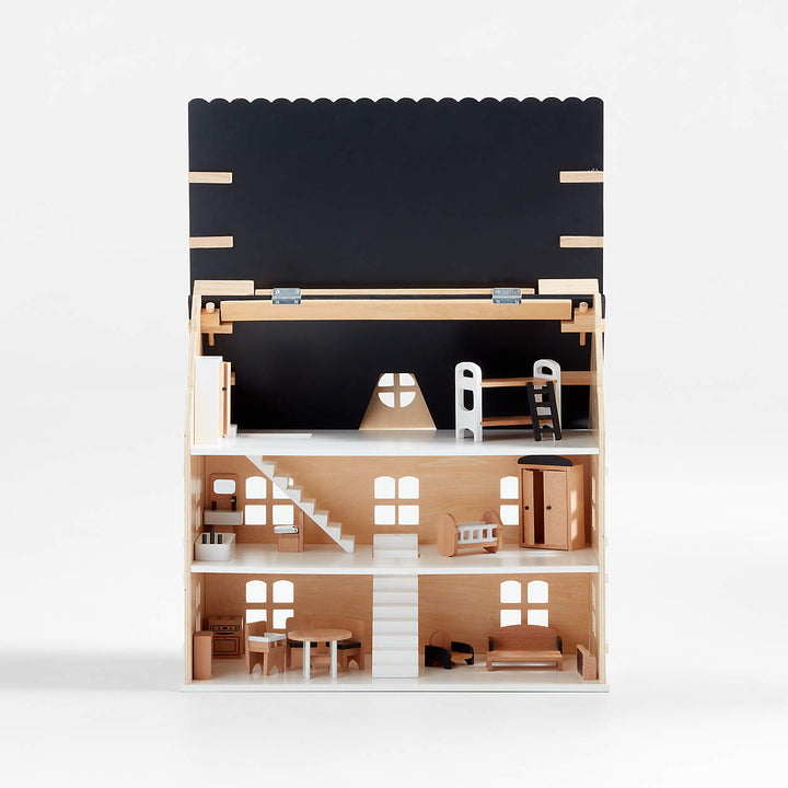 Casa de muñecas de madera con interior amoblado, tres pisos y accesorios de mobiliario en miniatura.