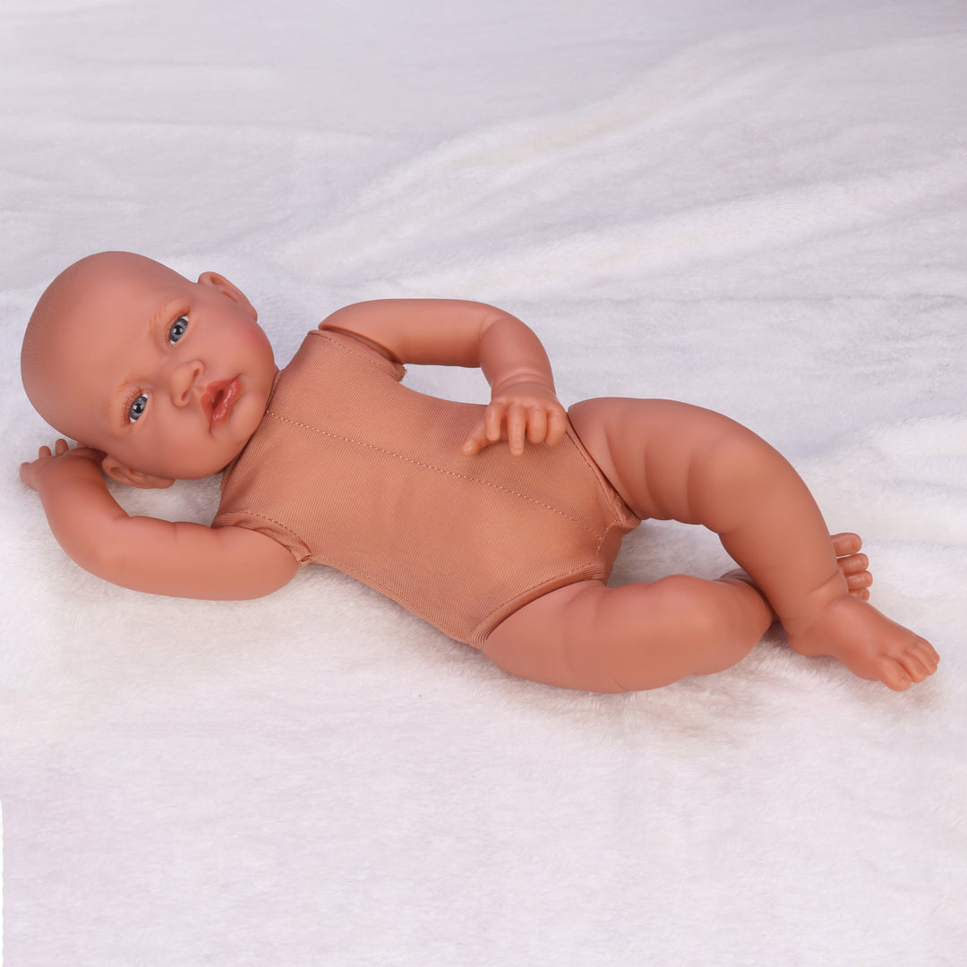 Muñeca bebé reborn cuerpo completo de goma, sin ropa, mostrando detalles realistas.
